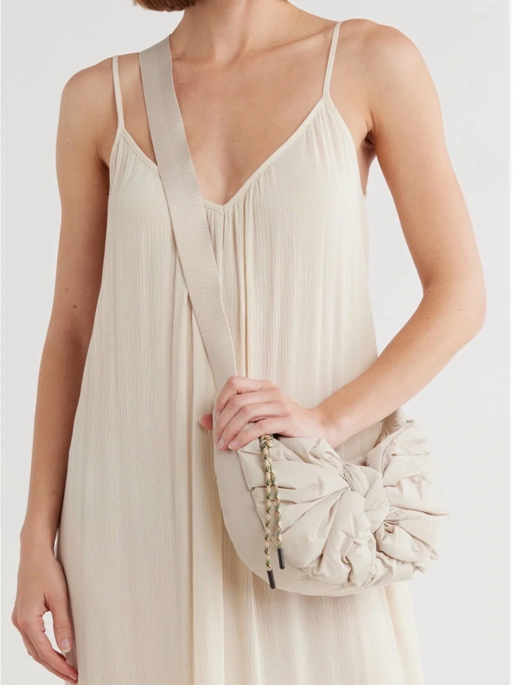 10. Dolce Vita $160 Beige Knot-Detail Shoulder Bag Nylon